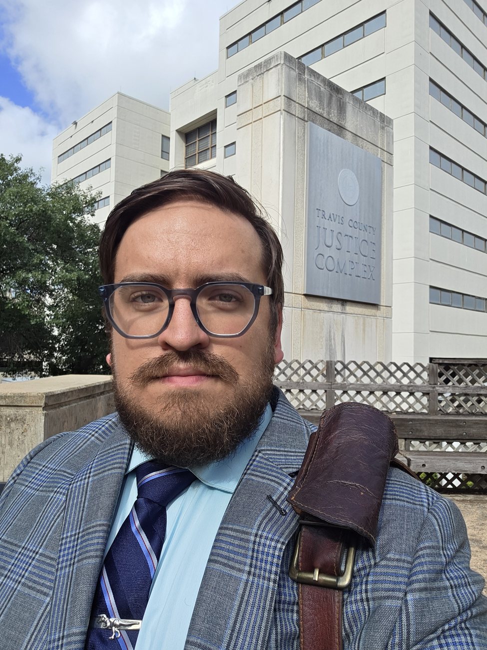 Taylor Matthews outside the Travis County Justice Complex in Austin